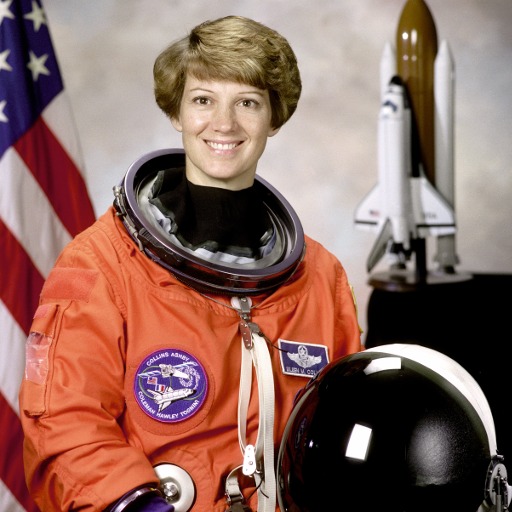Portrait of an astronaut in front of a flag: the original photo